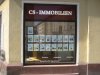 CS-Immobilien, Schaufensterverklebung, Glas-Beschriftung, Werbebeklebung auf Fenster, MÃ¼nchen Folienschriftzug